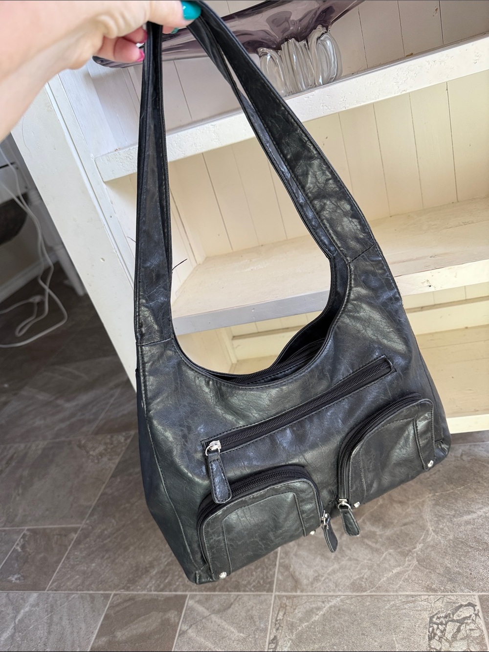 hobo-style slouchy silhouette black crinkle leather shoulder bag front pockets